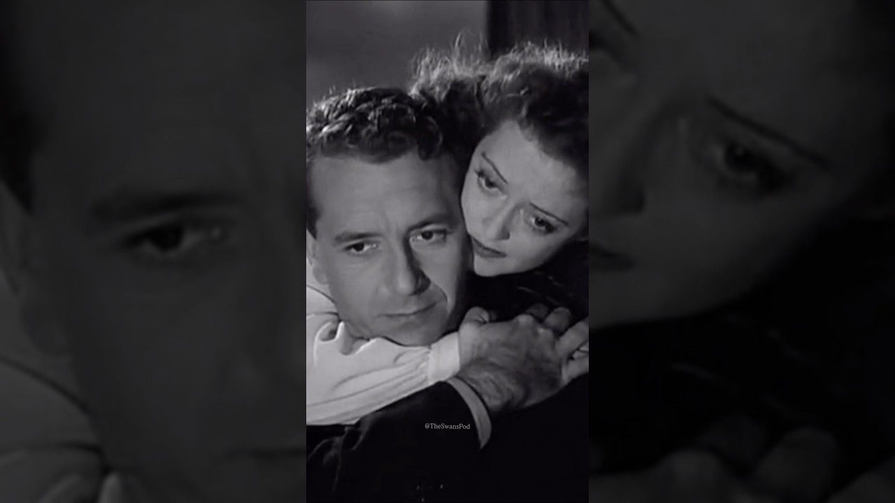 Bette Davis and Paul Henreid in DECEPTION (1946) a film noir directed by Irving Rapper.