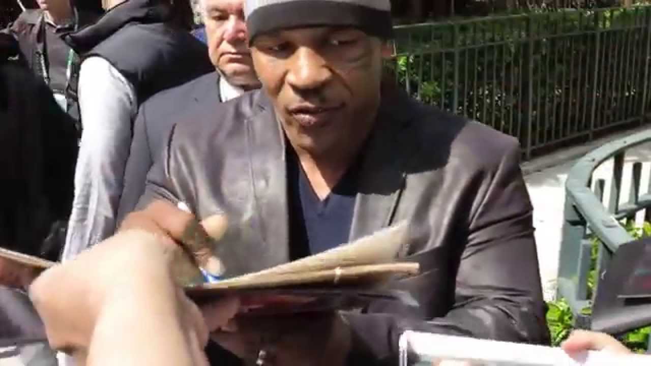 Mike Tyson signing autographs  at Tribeca Film Festival. E1autographs