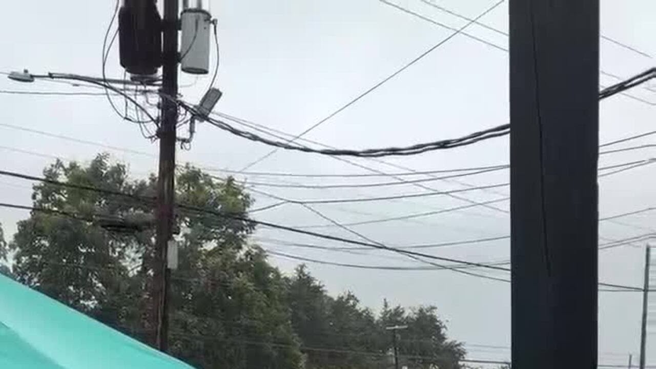 Tubing on Youree Drive during flash flooding