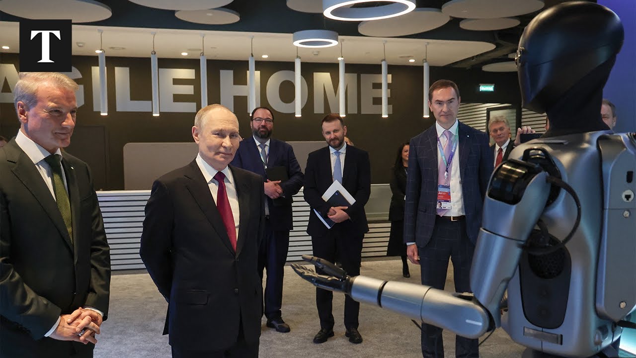 Putin Stares Down Dancing Robot in Moscow