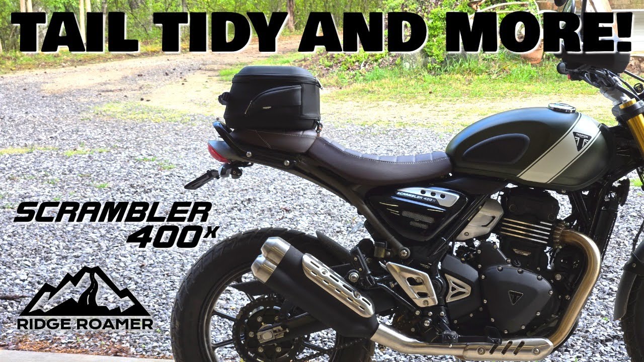 Начальные модификации Scrambler 400X — устройство для уборки хвоста, место для хранения сумки на ...