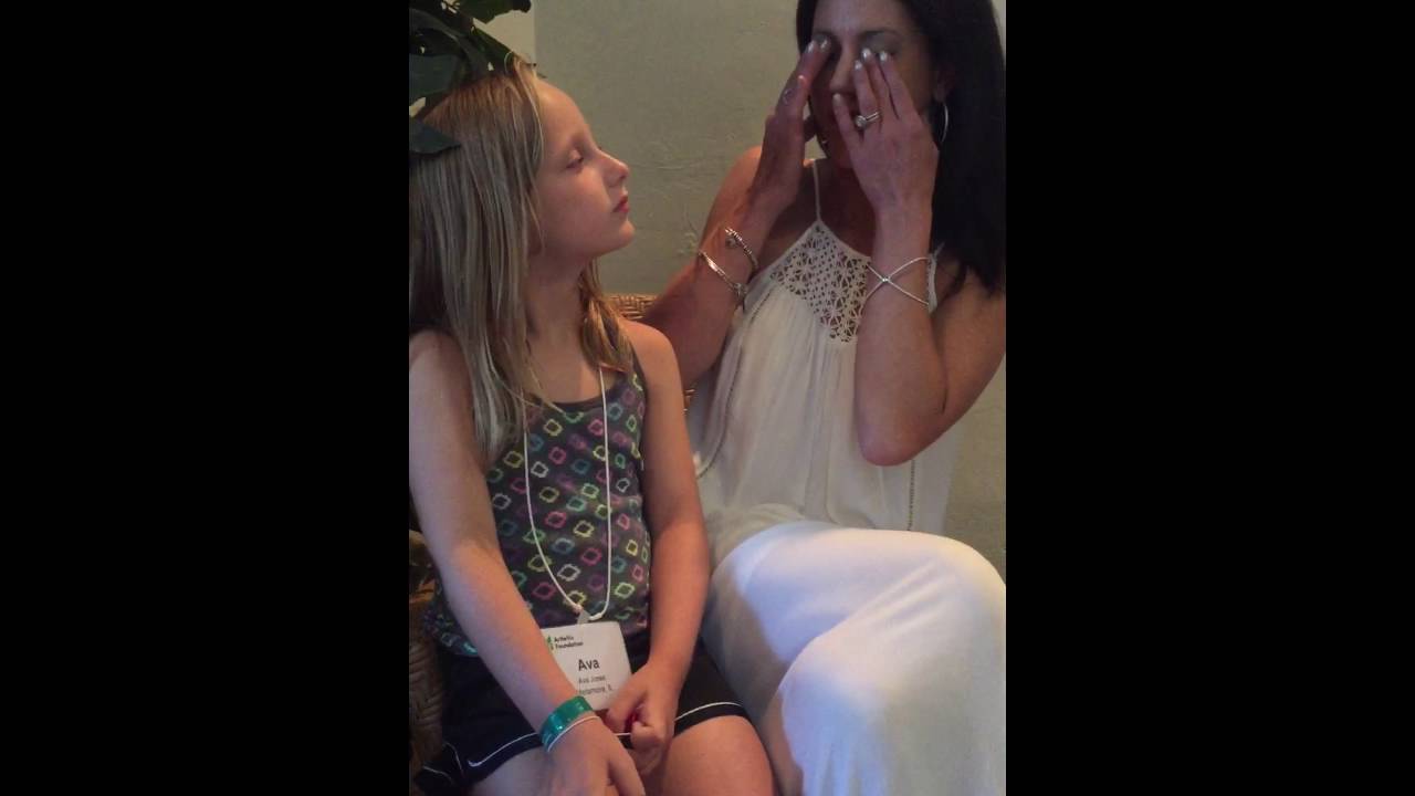Joy takes out her prosthetic eyes for little girl who's going blind from Juvenile Arthritis