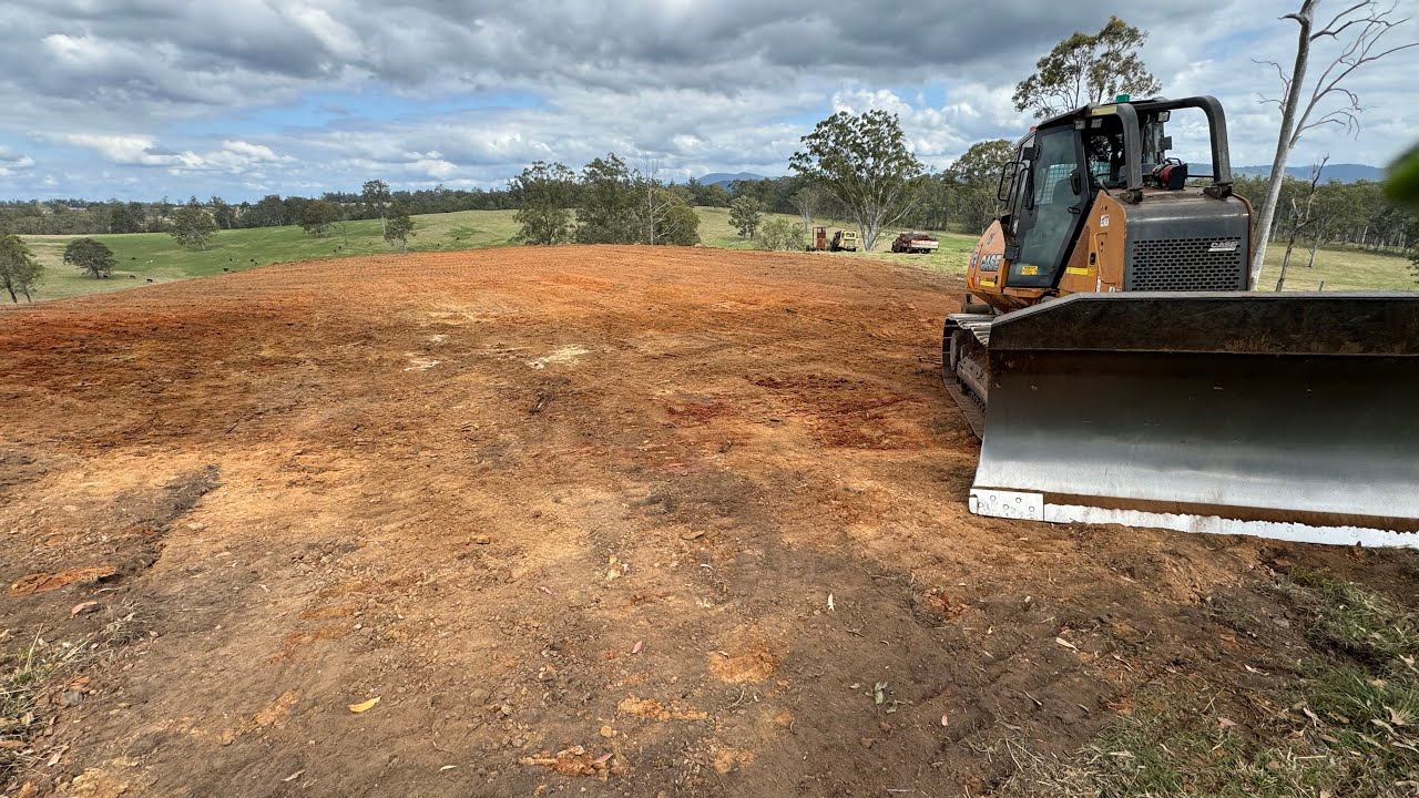 D6 dozer prepping and finishing a shed pad