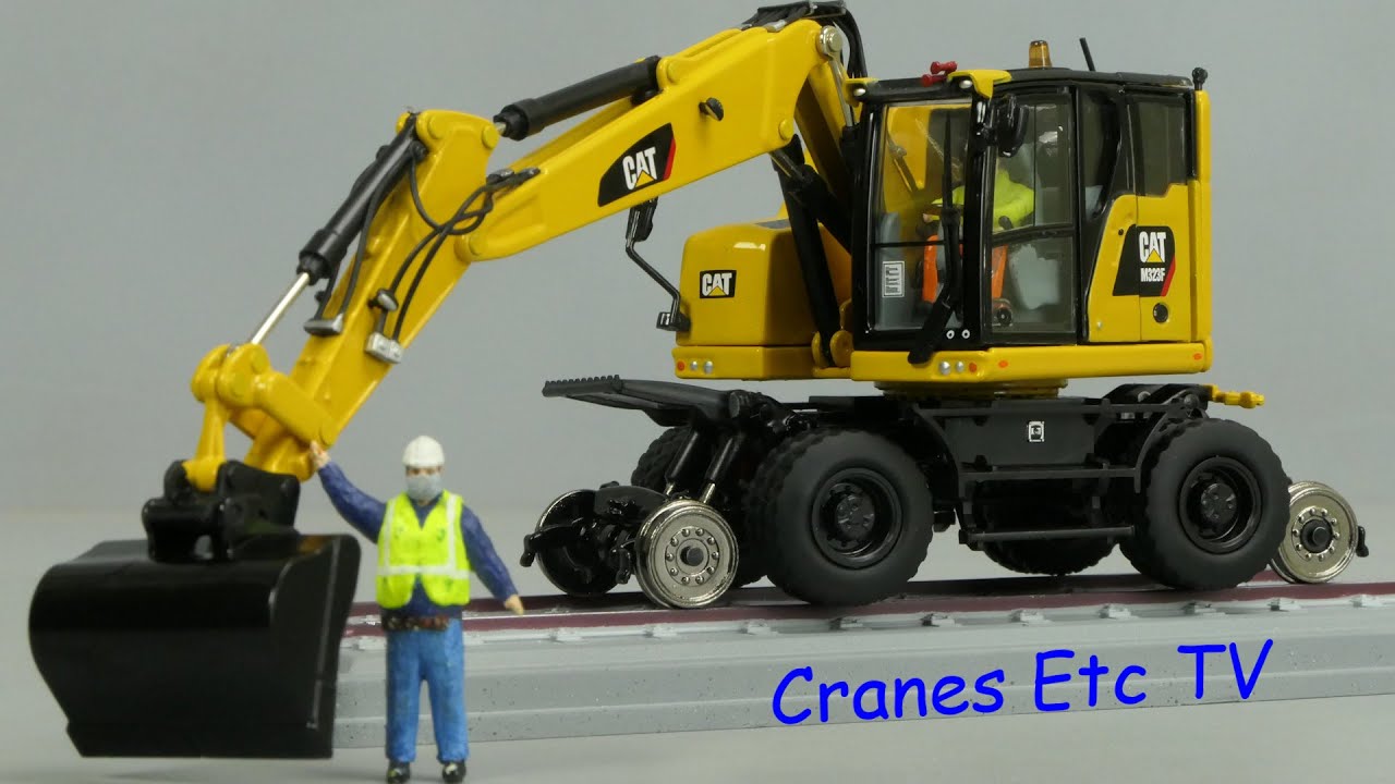 Diecast Masters Caterpillar M323F Railroad Wheeled Excavator by Cranes Etc TV