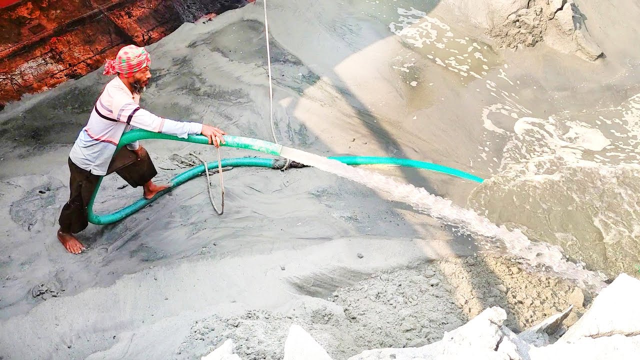 Sand unloading from a big barge by high power water pump  | Sand Flow Chronicles