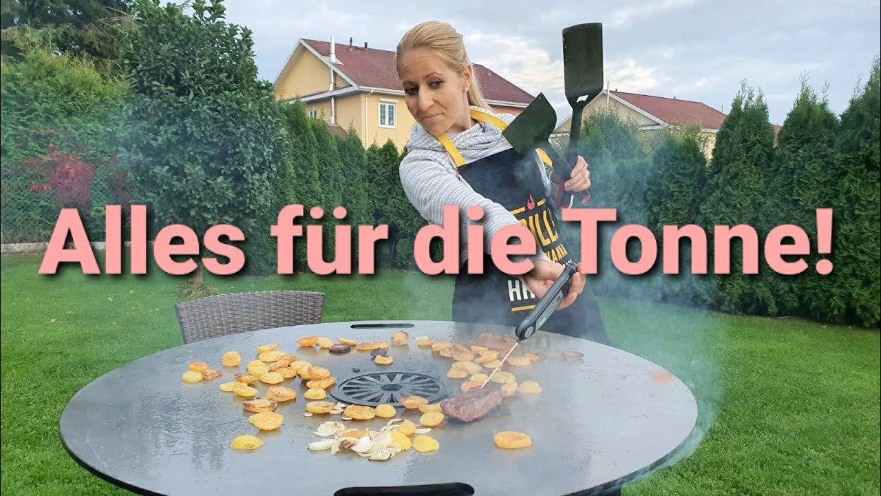 Grilltonnen und Feuerplatten aufs Grillen vorbereiten