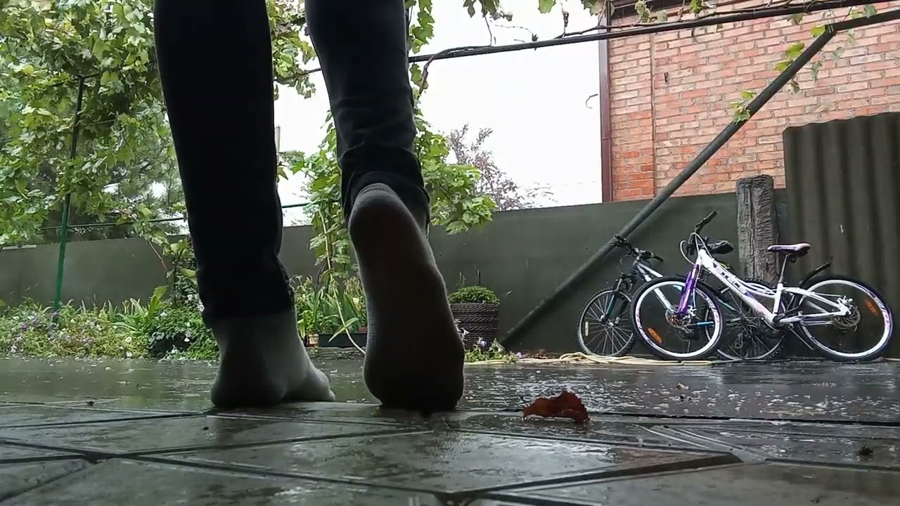 Old grey socks in rain