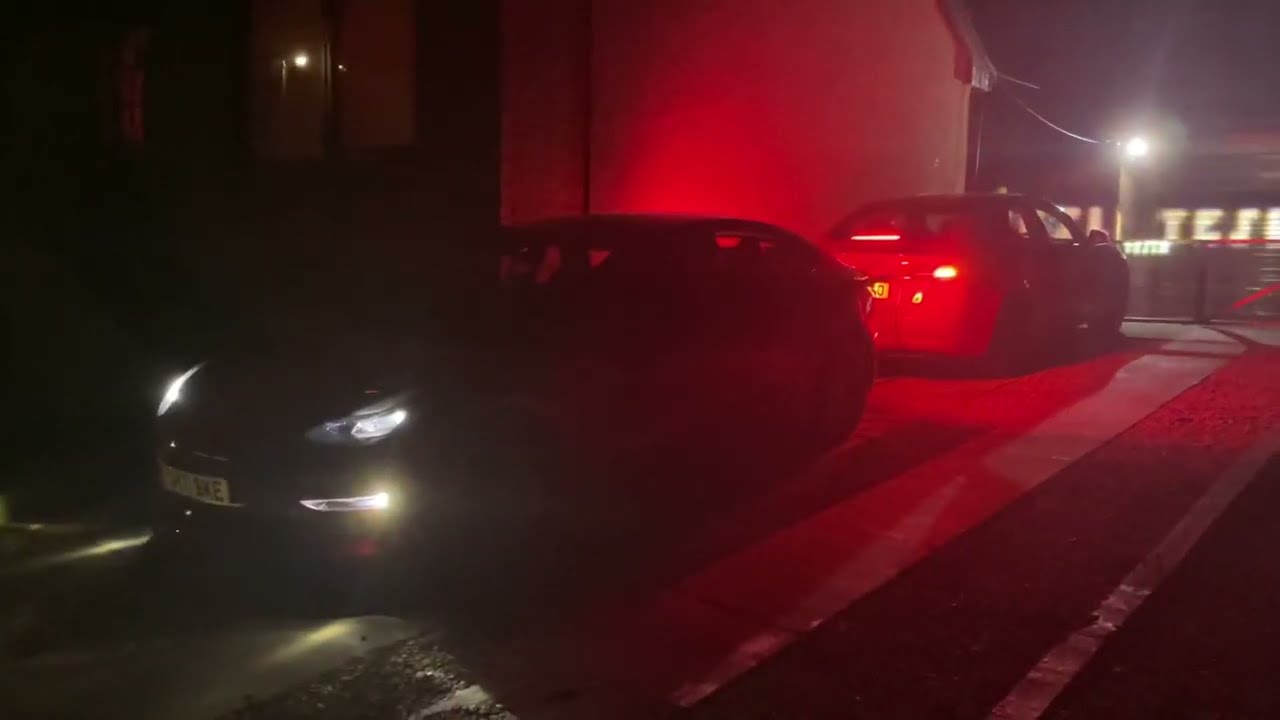 The Tesla Christmas lightshow on two synced cars.