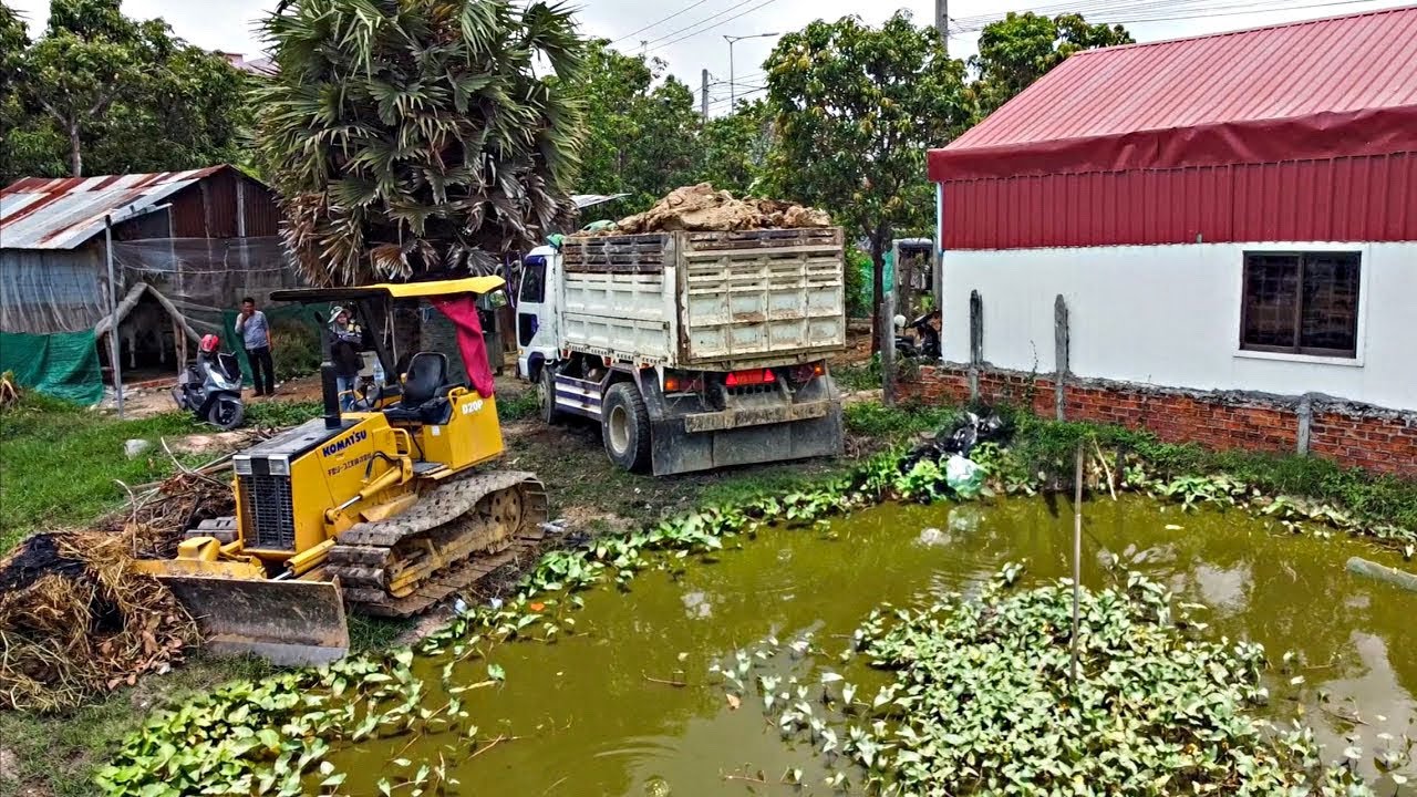 Amazing Start New Project!! Dump Truck Unloading Soil With Komat'su D20P Dozer