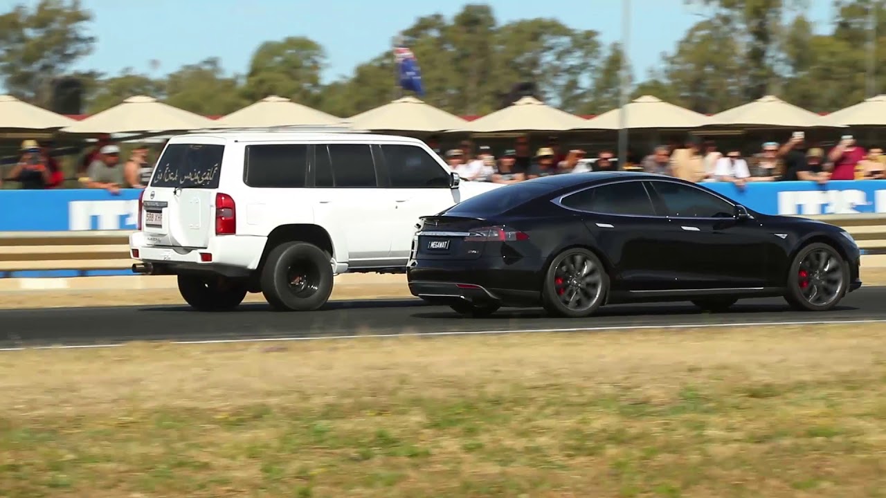 MENTAL 800HP PATROL SMASHES TESLA IN RACE POWERCRUISE 2017