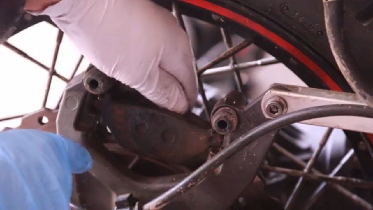 Yamaha Super Tenere rear brake pad change.