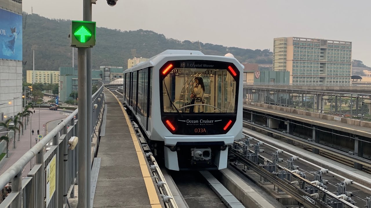 Macau LRT [Taipa] Crystal Mover (Ocean Cruiser) (Set 033) departing Cotai East (Taipa Ferry Ter) 🇲🇴
