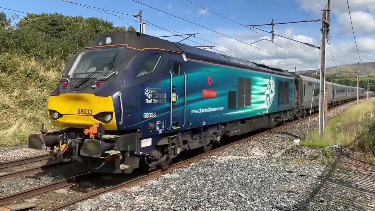 Direct Rail Services. 68033 &ldquo;The Poppy&rdquo; with TransPennine Express Stock.