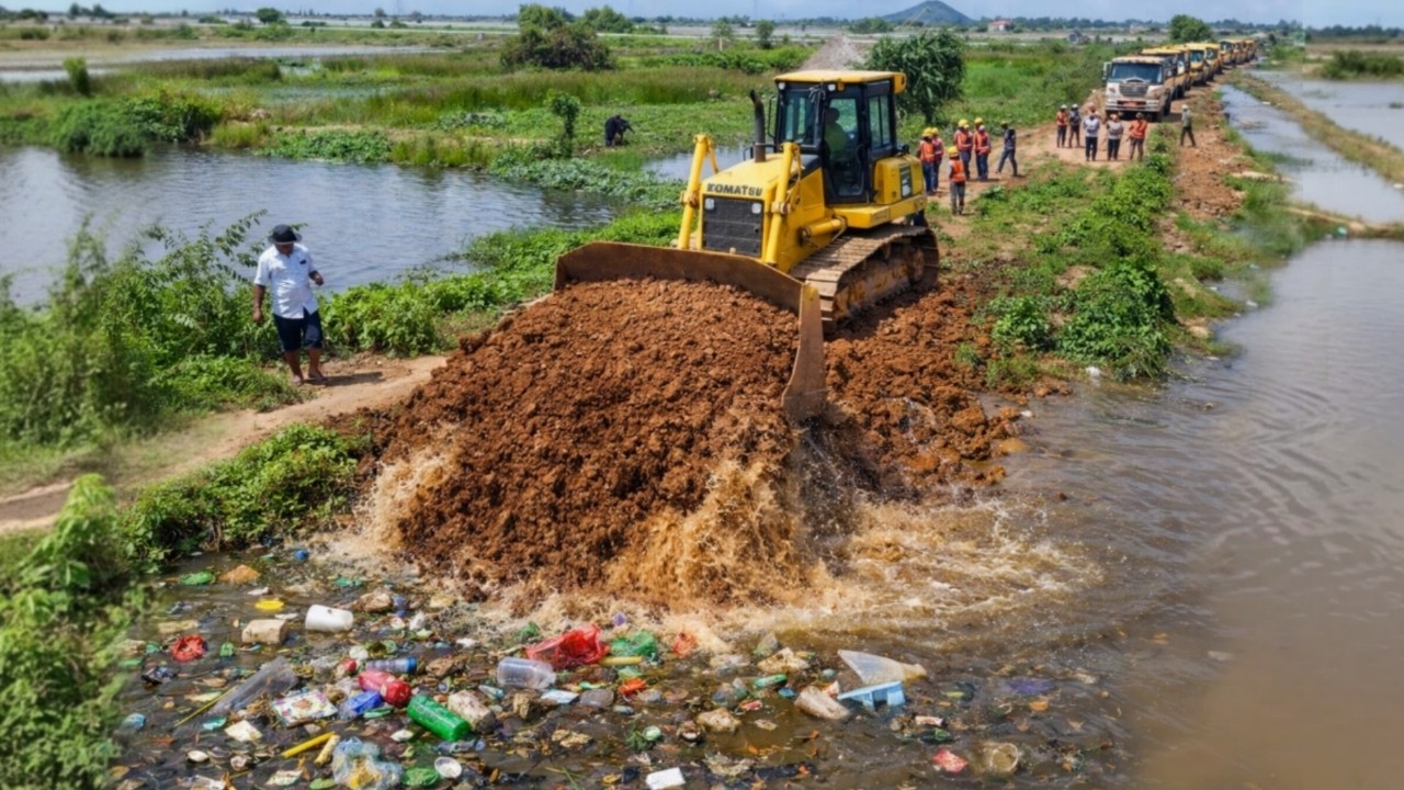 Nicely Rebuilder Old Road On The Flooded Area Process by Bulldozer Komat'su Push & Dump Laoding Soil