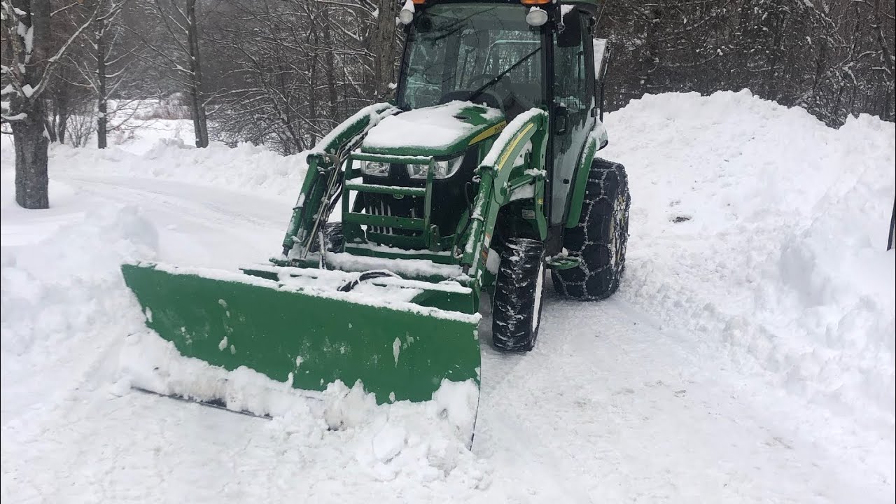 John Deere 3046R Plowing Spring Snow