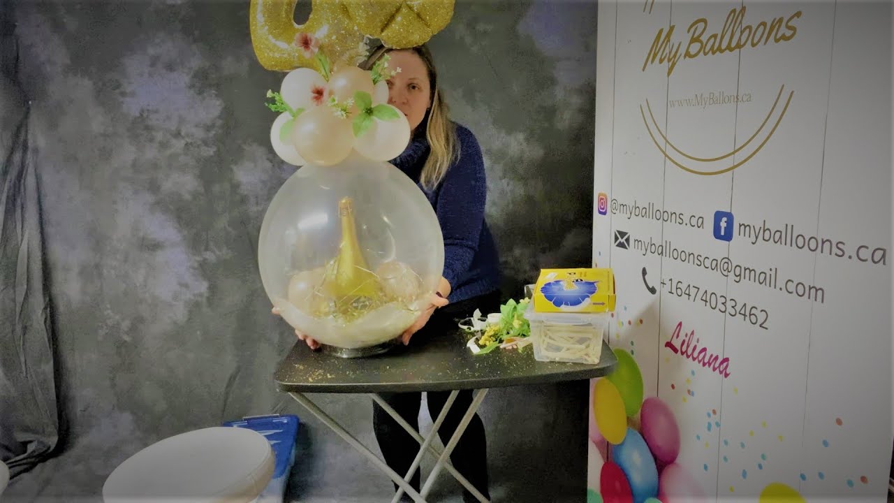 Champagne bottle inside balloon. HOW? EXPLAINED.