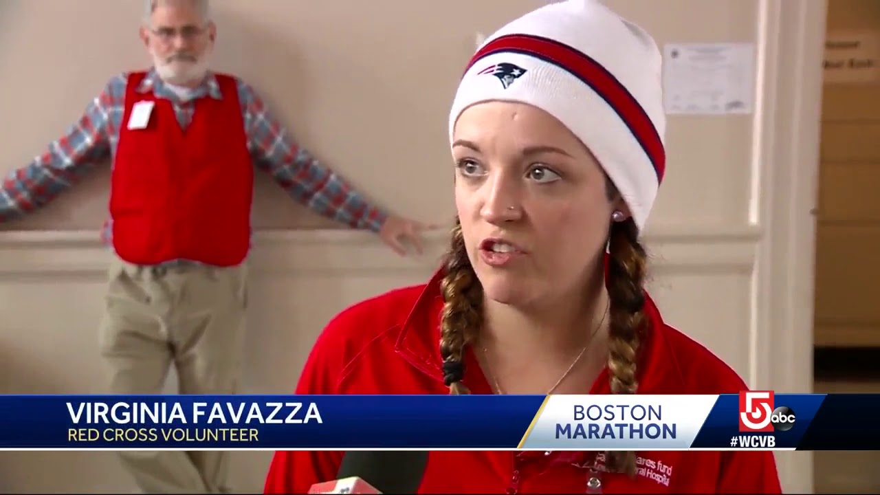 Boston Marathon runners brave rain, cold weather