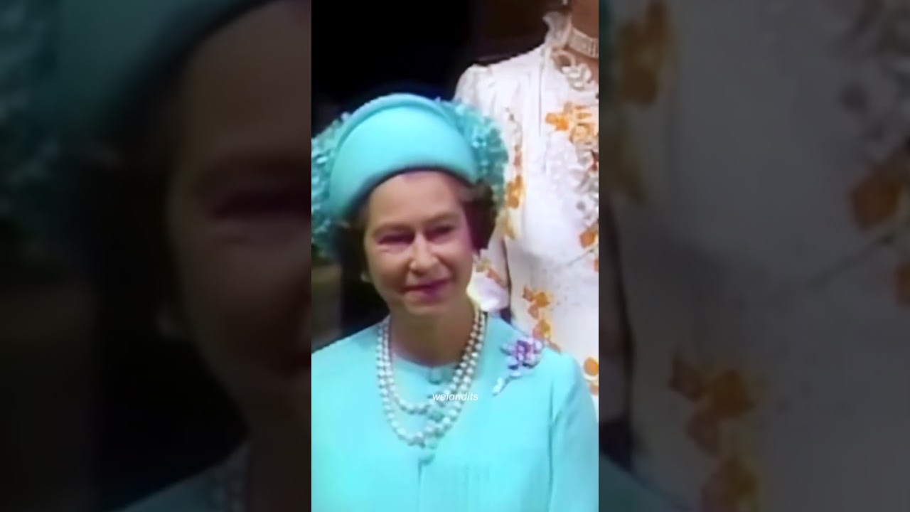 Queen Elizabeth II reacts at the wedding of Prince Charles and Lady Diana on June 29, 1981