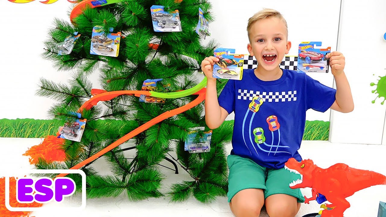 Vlad y Niki decoran el árbol de Navidad