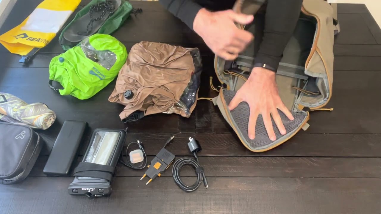 Packing using Scrubba Wash Bags and a 21L backpack.