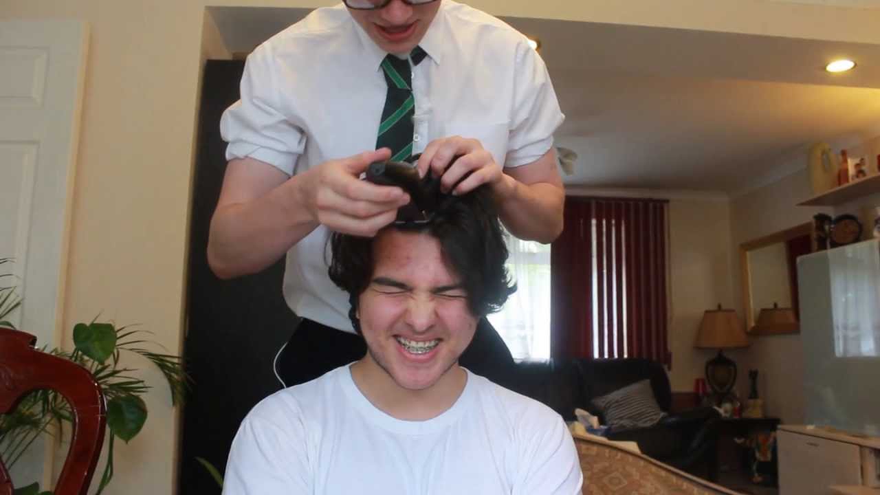 Wisam shaves his head for Cancer research UK.