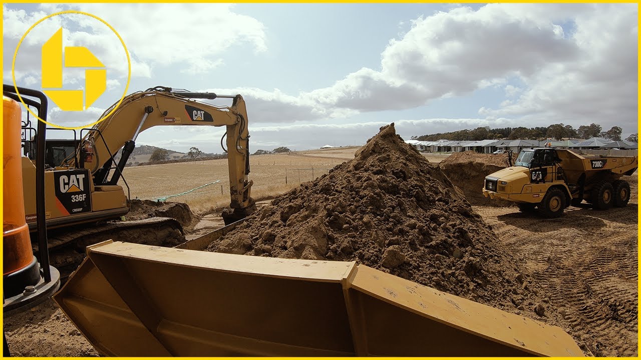 Caterpillar 730 Dump Truck at work