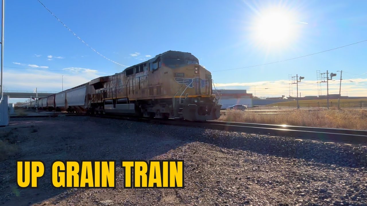 Union Pacific Grain Train Passing Through Town