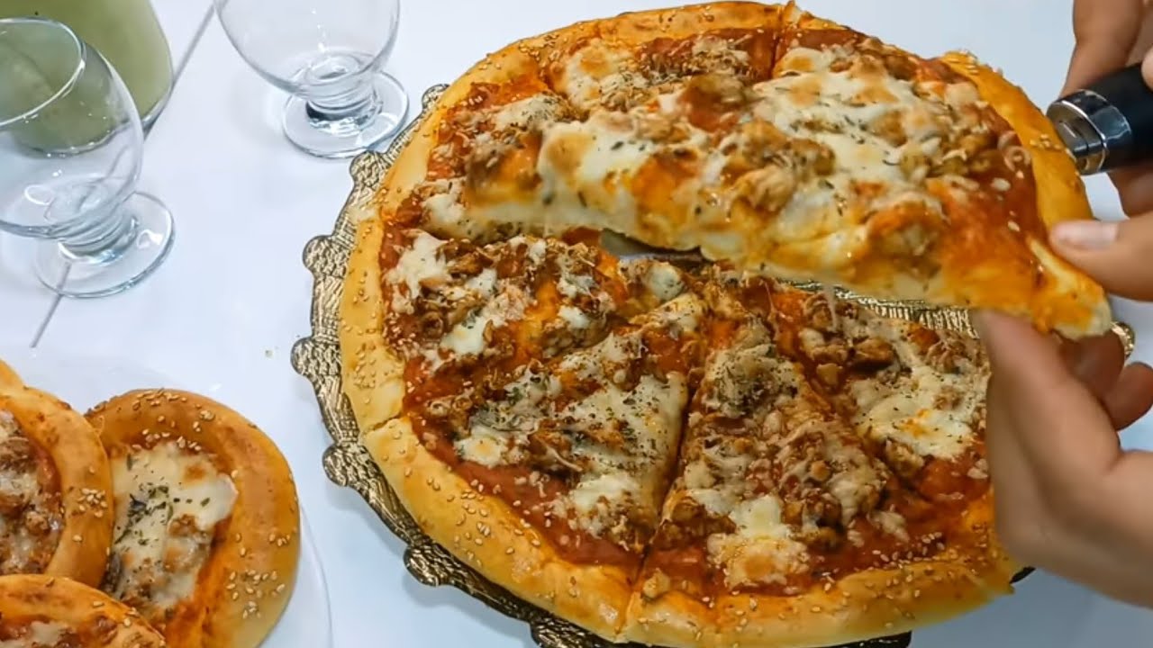 جديد📣 فطائر 2022 البيتزا ب صوص مختلف بدجاج الشاورمة حماقو عليها لي داقها عندك يطلب المقادير من