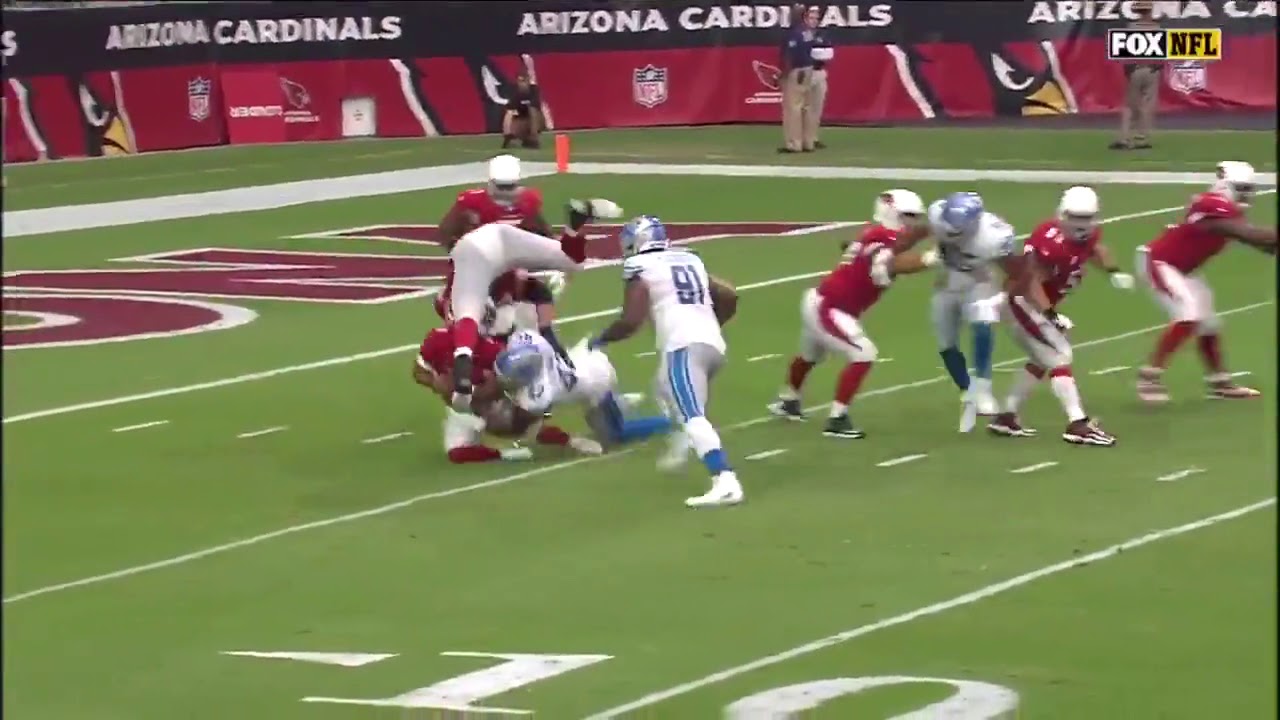 Cardinals offensive lineman JR Sweezy helps the Lions sack Kyler Murray
