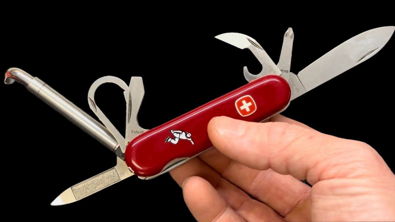RARE discontinued Swiss Army Knife Wenger Swissroller