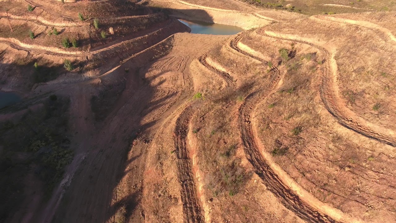 Flying over a water-landscape designed farm in Portugal I