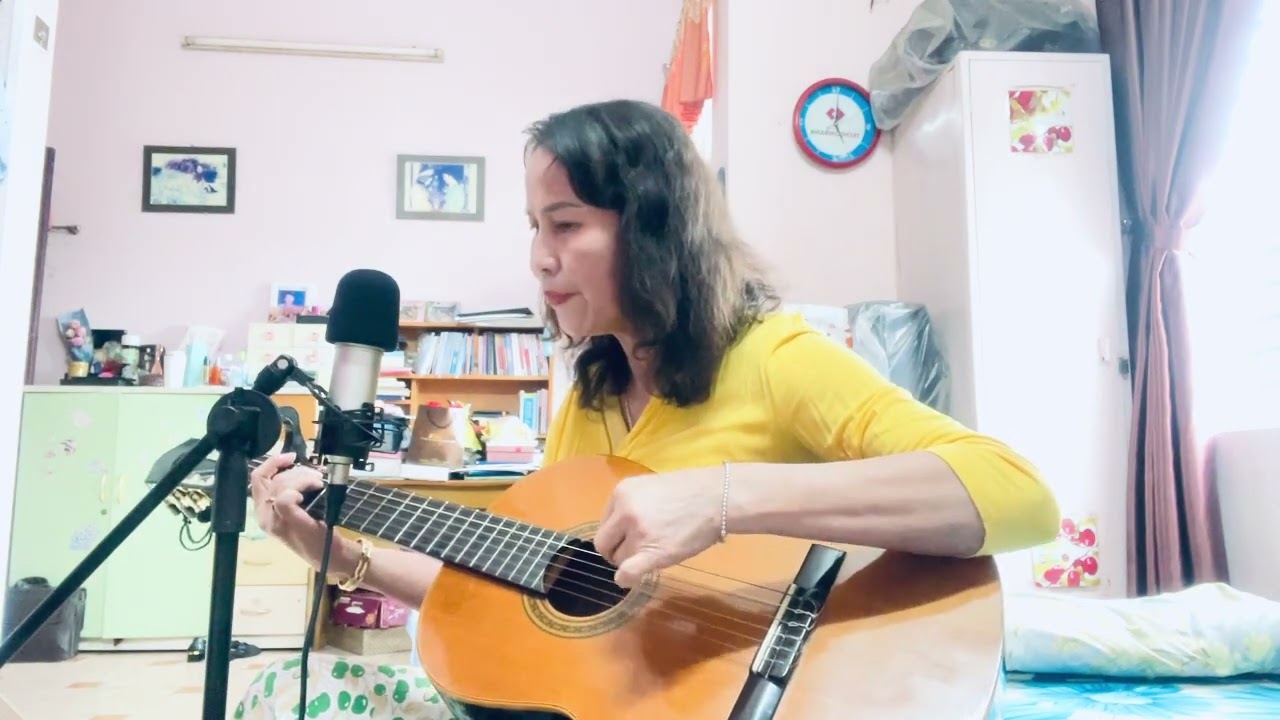 Đan áo mùa xuân - sáng tác Phạm Thế Mỹ