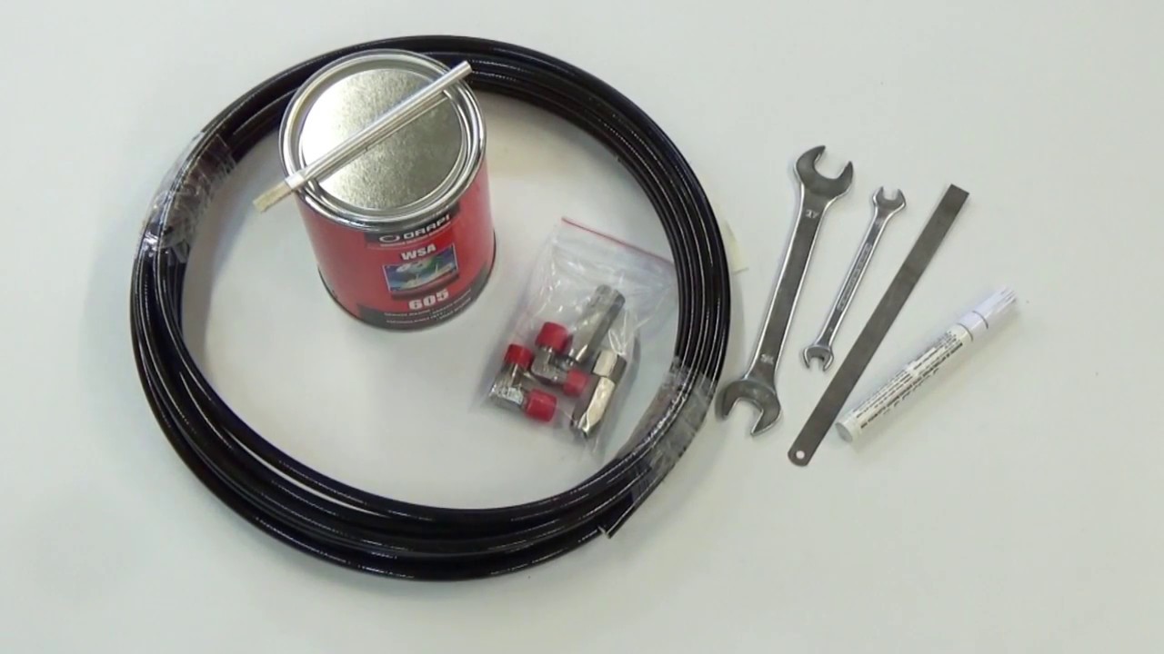 Sertissage d'un raccord à visser sur tuyau souple