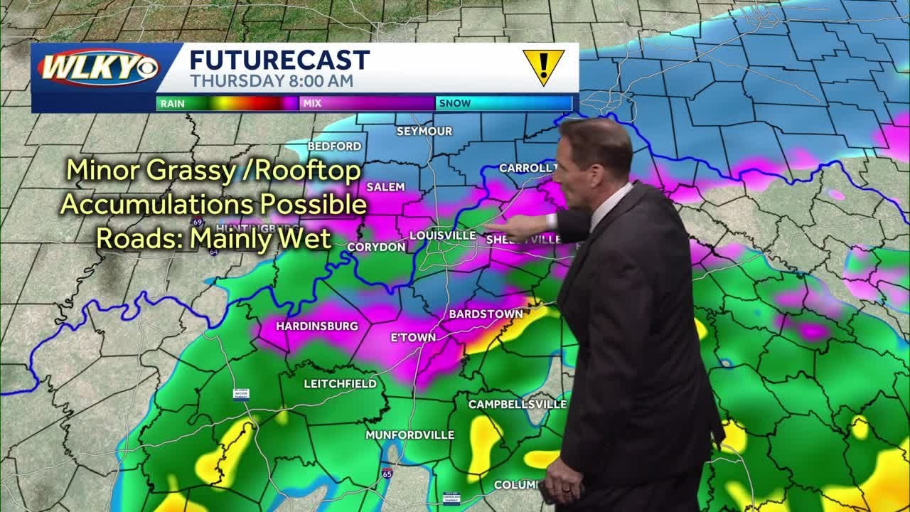Light rain and some wet snow late tonight and early Thursday