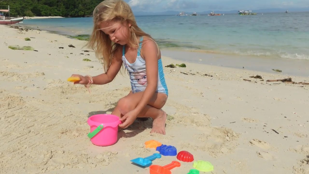 Children playing on the beach 4K