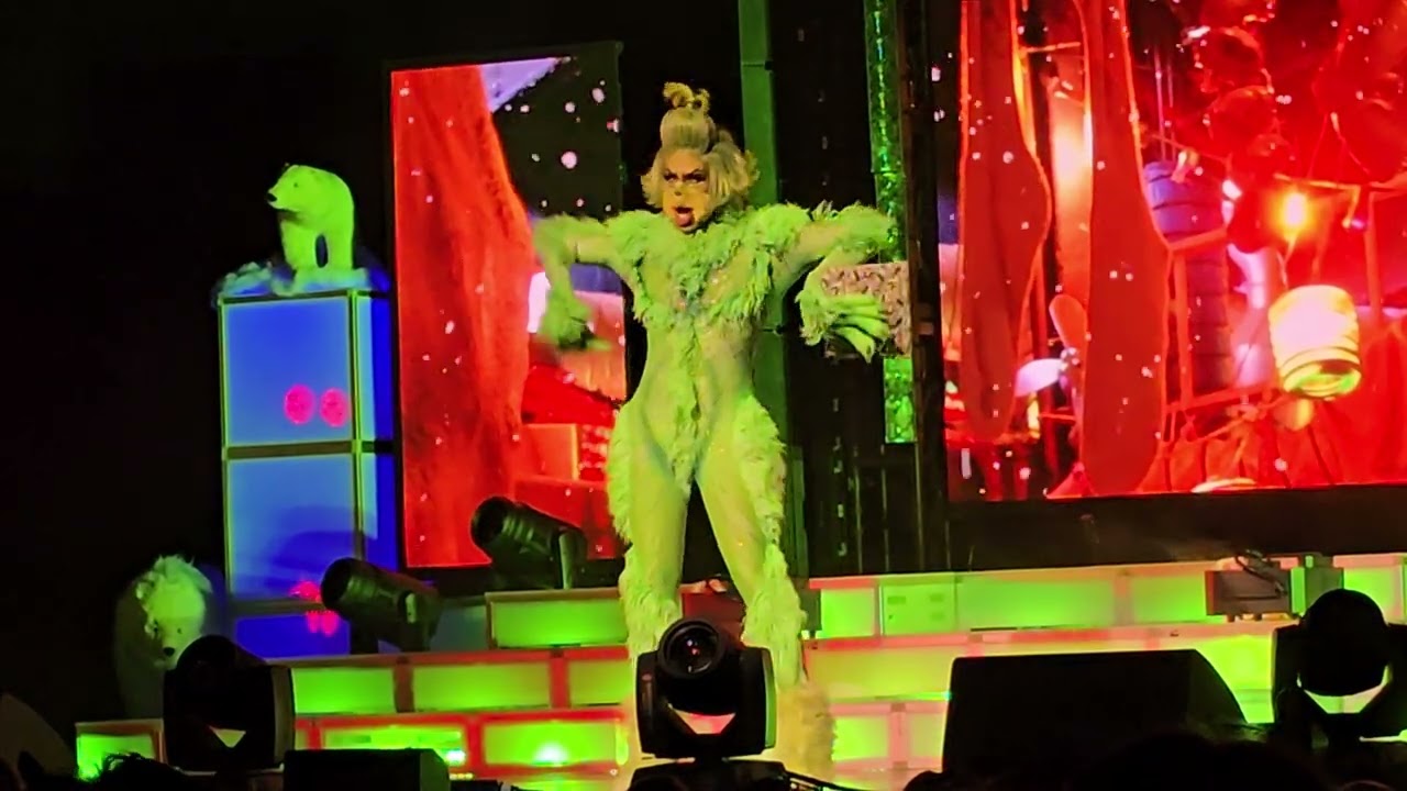 Shea Couleé as The Grinch