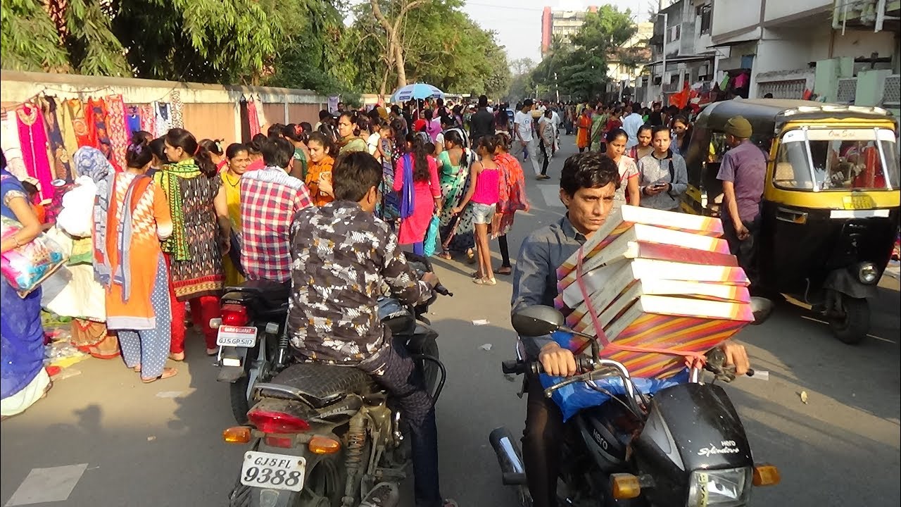 A motorbike ride through an Indian Street Flea Market in Katargam, Surat, (then ride to Ring Road).