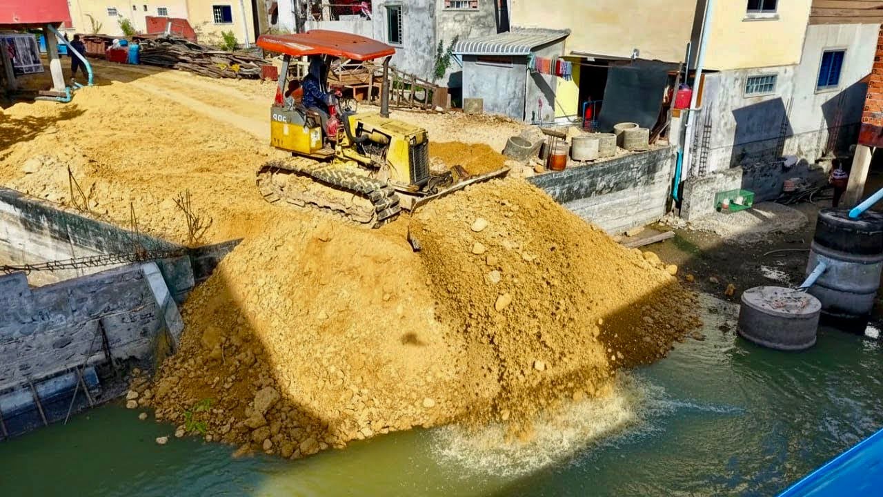 Start Opening New Project!Bulldozer KOMAT'SU D20P pushing Soil into​sinkhole has water& 5Ton Trucks.