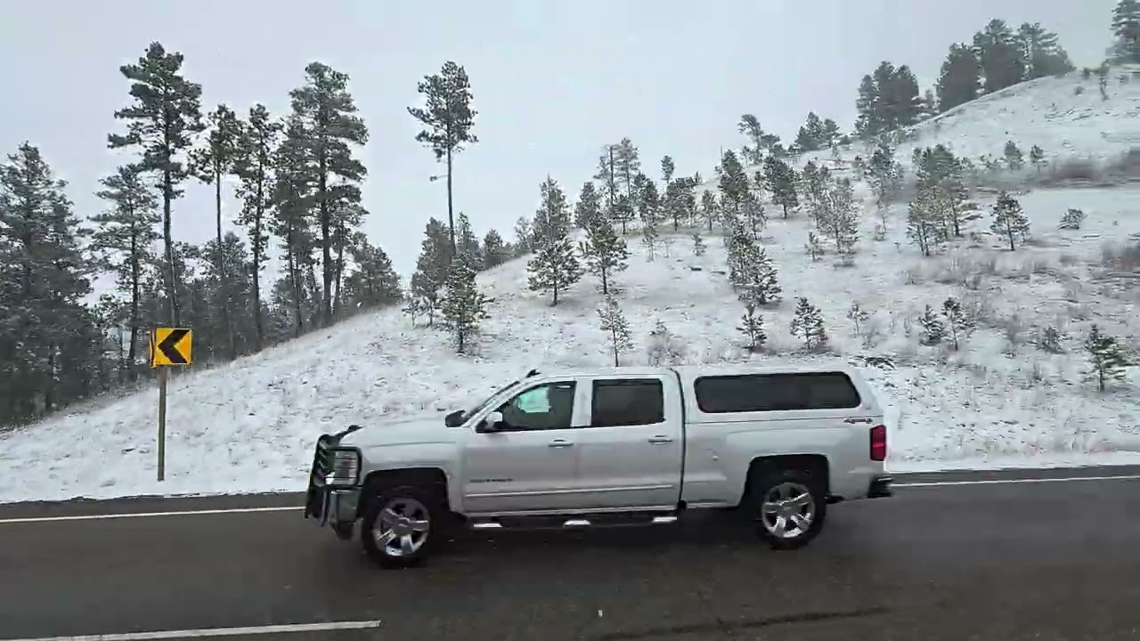 The Scenic Perspective: Route 212 Side-View: A Snowy Drive from Montana to South Dakota