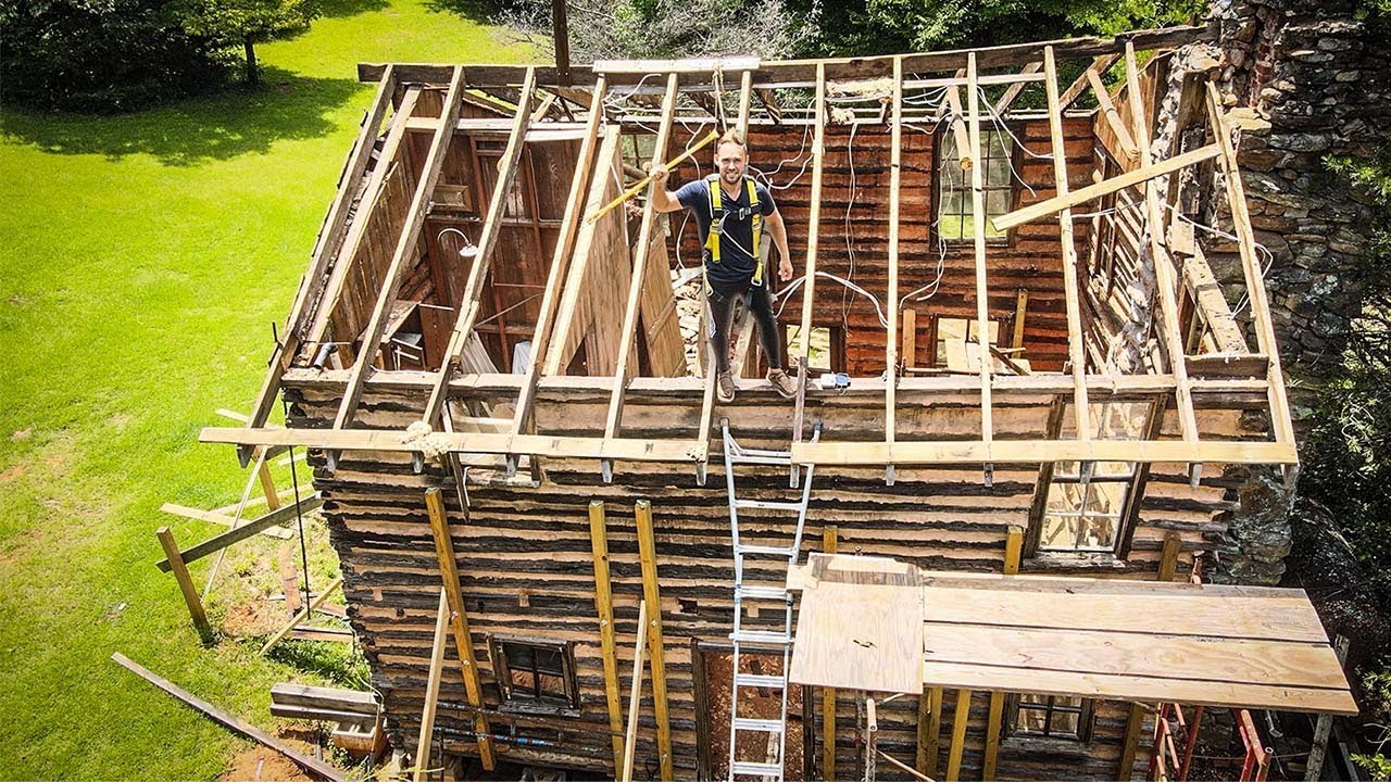 Dismantling Roof of Abandoned Lincoln  Log Cabin