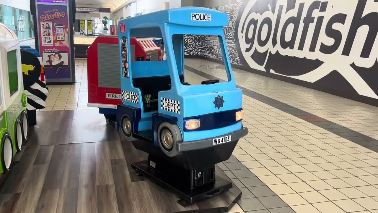 Whittaker bros police van kiddie ride at Liberty tree mall (Eletech refurb) (plays car sounds) (POV)