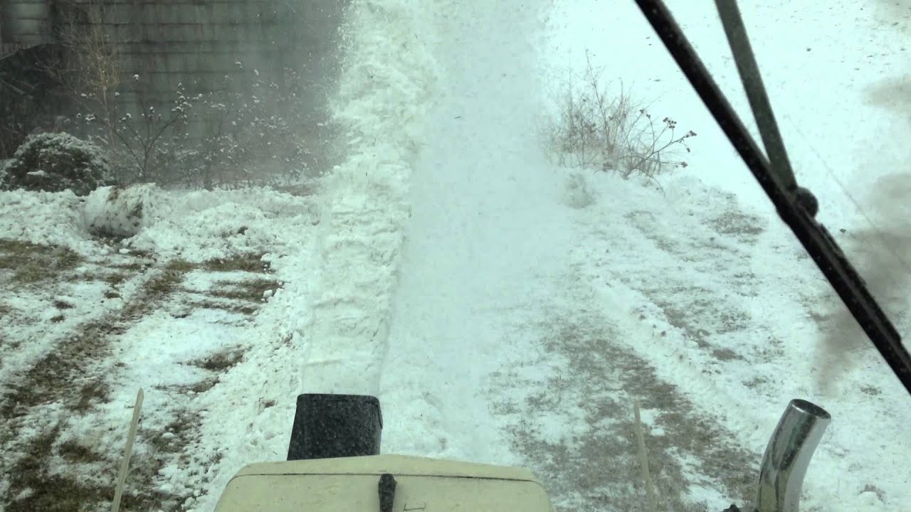 Cub 1572 blowing some snow