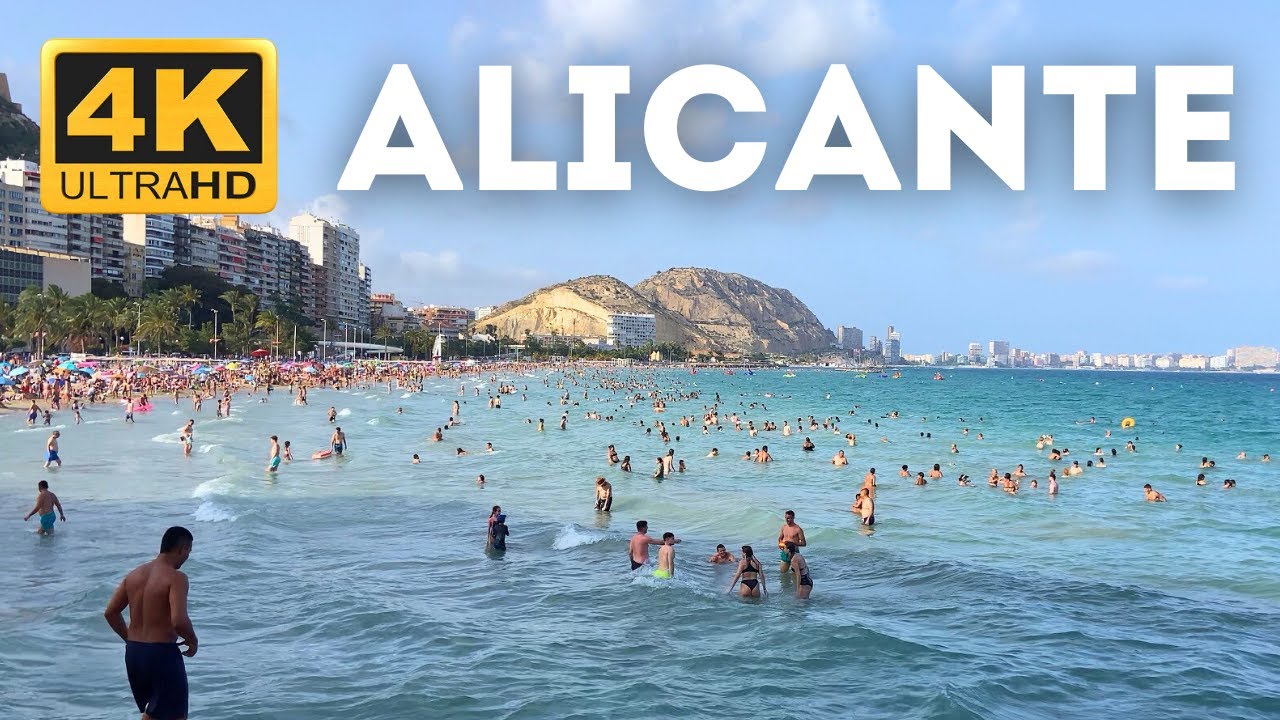 Spacer wzdłuż promenady na plaży Postiguet | Alicante, Hiszpania