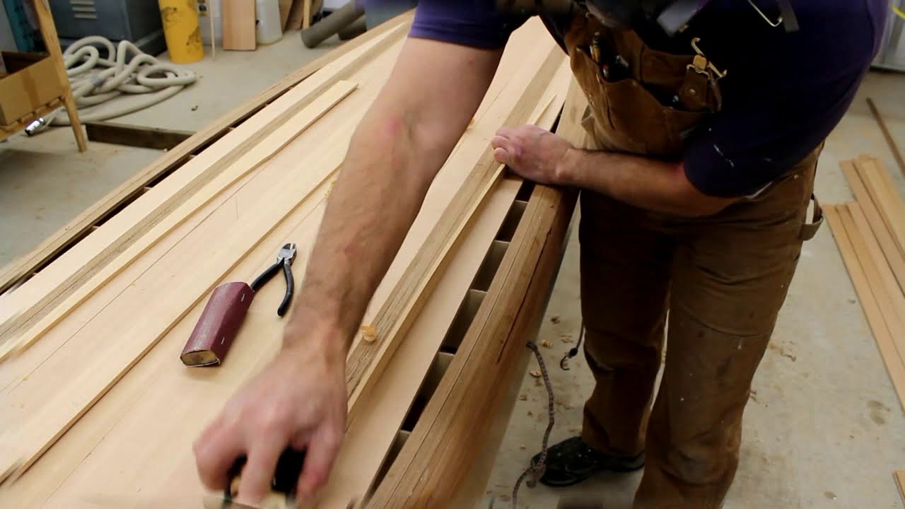 Planking a wooden paddleboard hull