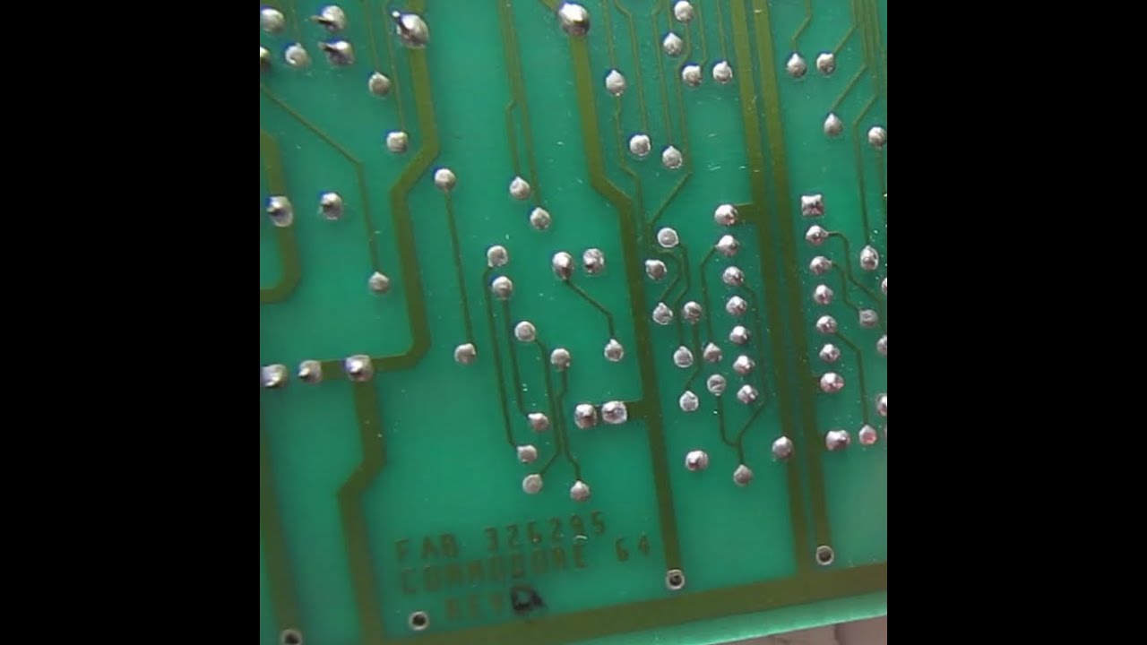 Restoring a C64 PCB 326295 Rev A. The first C64 PCB revision.