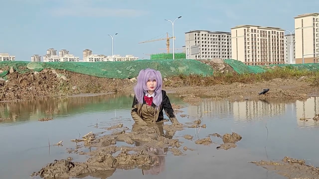 Uniform with black leather shoes playing in the mud