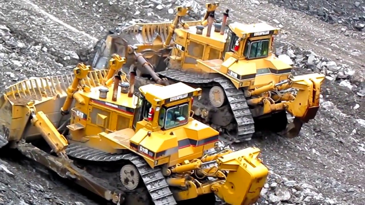 Caterpillar D11R Carrydozer's Hogging Shot Rock