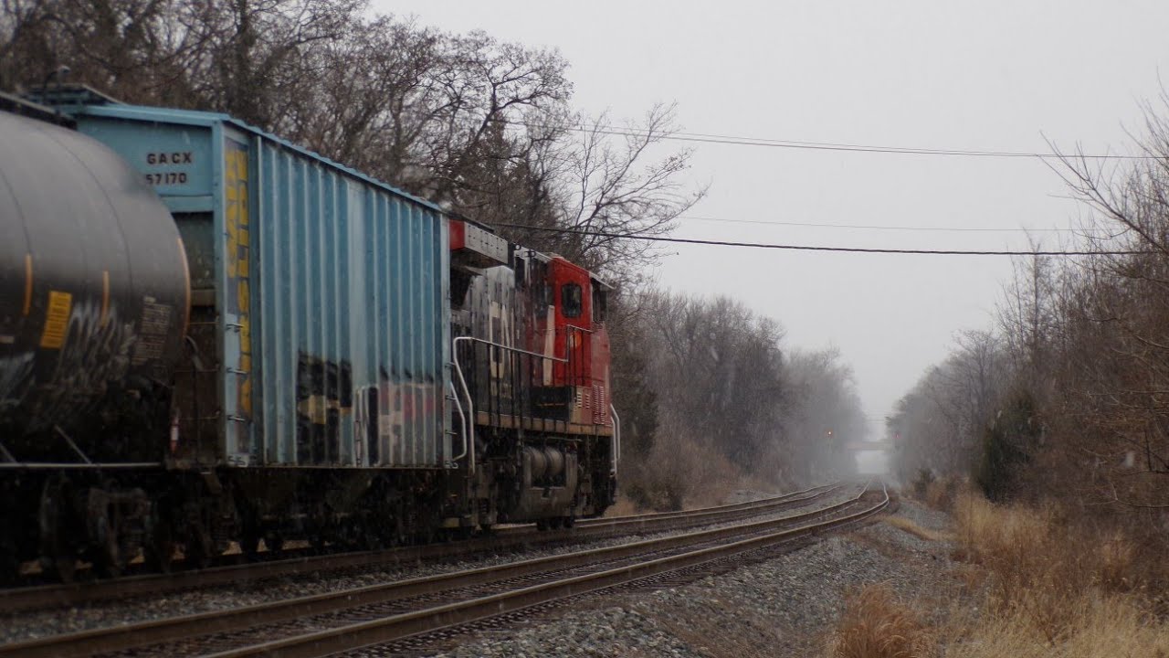 CSX B705-15 With CN Power In Rosedale
