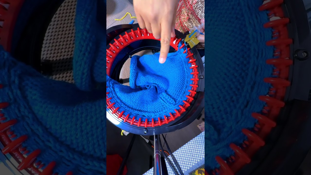Showing details on recasting on the arm to knit the sleeve on AddiExpress