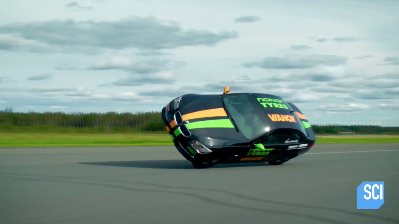 Watch This Man Set The World Speed Record While Driving His Car On Two Wheels!